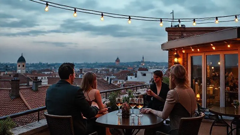 A photorealistic, professional photography, 8K, cinematic lighting, sharp focus, depth of field, shot on a high-end DSLR, of a charming, intimate rooftop terrace bar in an old European city. The view showcases historic terracotta rooftops and a distant, iconic landmark. Soft, warm string lights are strung overhead, and a few elegantly dressed patrons are enjoying quiet conversations over aperitivos. The atmosphere is cozy and exclusive.